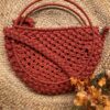 amlavati_round_sling_rust_bag